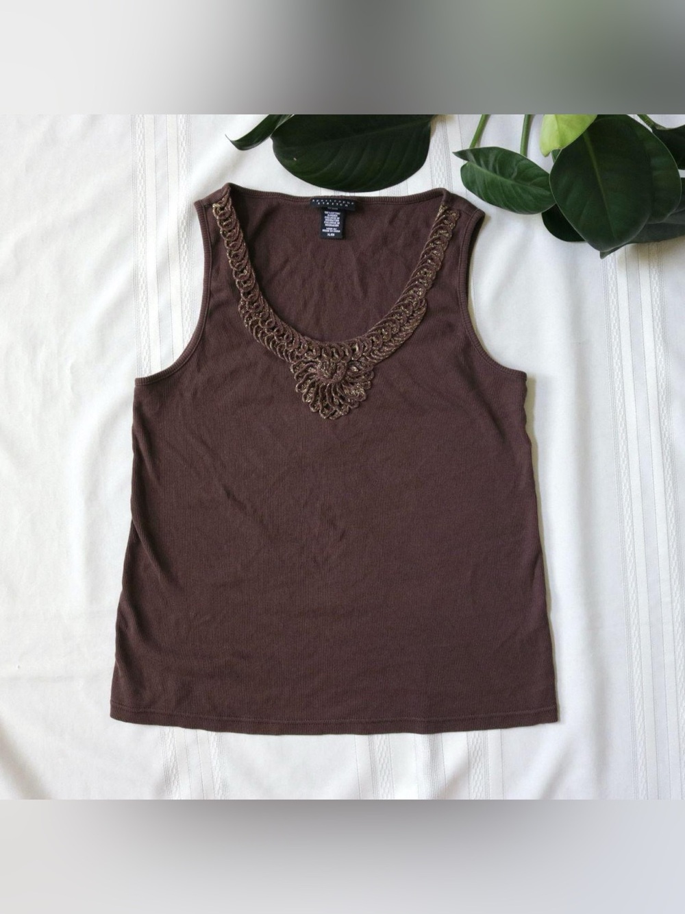 Apostrophe brown tank top with gold detail around the collar